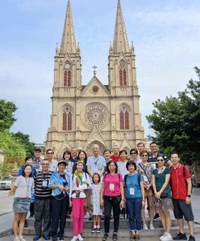Group photo outside the main entrance of Sacred Heart Cathedral