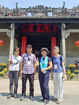 Four Chan's tour members took photo in front of Chen Clan Ancestral Hall