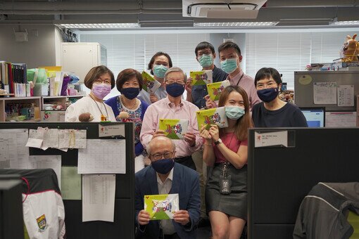 Dr. Kenneth Tse, Chairman of the Foundation, and two school Supervisors distribute the reusable face masks to College staff