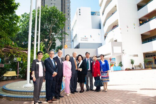 Group photo in front of Tong Siu Building