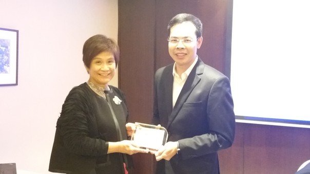 Mrs. Mabel Lee, Chairman of the Foundation, presented a thank-you plaque to Dr. Victor Ng