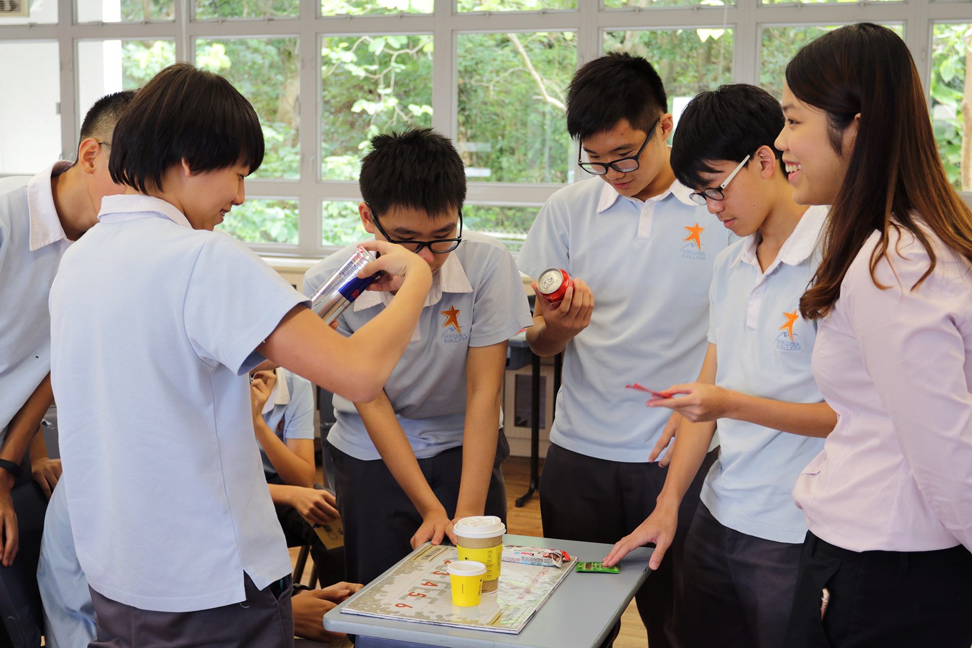 Students perform hands-on task given by the speakers.